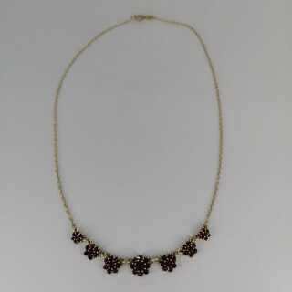 Gorgeous necklace in floral design gold-plated silver with deep red garnet