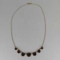 Gorgeous necklace in floral design gold-plated silver with deep red garnet