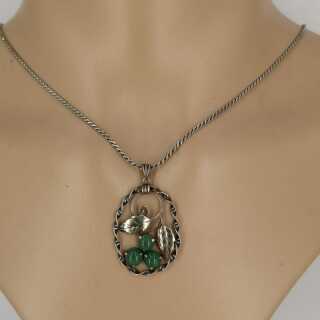 Beautiful art nouveau pendant in silver with leaf decoration and three chrysoprases
