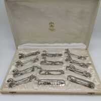 Set von 12 Art Deco Messerbänken mit Jagdmotiven in originaler Box