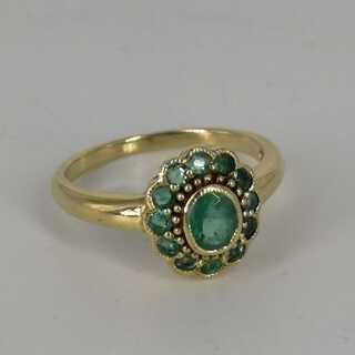 Beautiful ladies ring in gold with emeralds