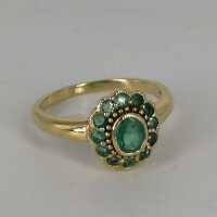 Beautiful ladies ring in gold with emeralds