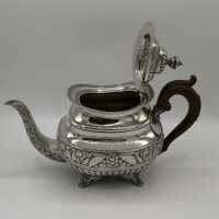 Antique large tea set in silver with unusual decoration