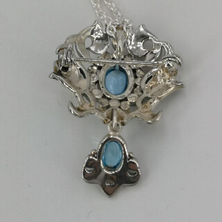 Combined brooch pendant in silver with topazes and pearls 