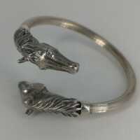 Fancy beautiful ladies bangle with horse heads in silver