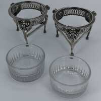 Pair of antique silver saliers with sphinx depictions and glass inserts