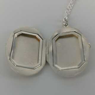 Oval locket with chain in silver for two photos