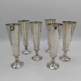 Elegant set of champagne flutes in solid silver in a timeless design