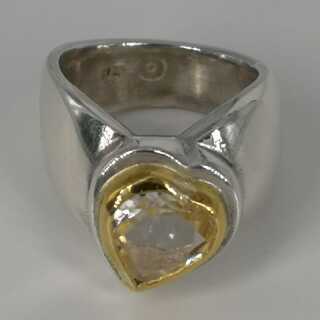 Unique band ring in silver and gold with heart-shaped citrine